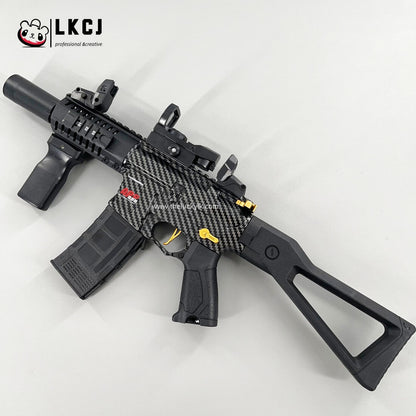 Carbon Fiber Gold Embellished ARP556 Gel Blaster